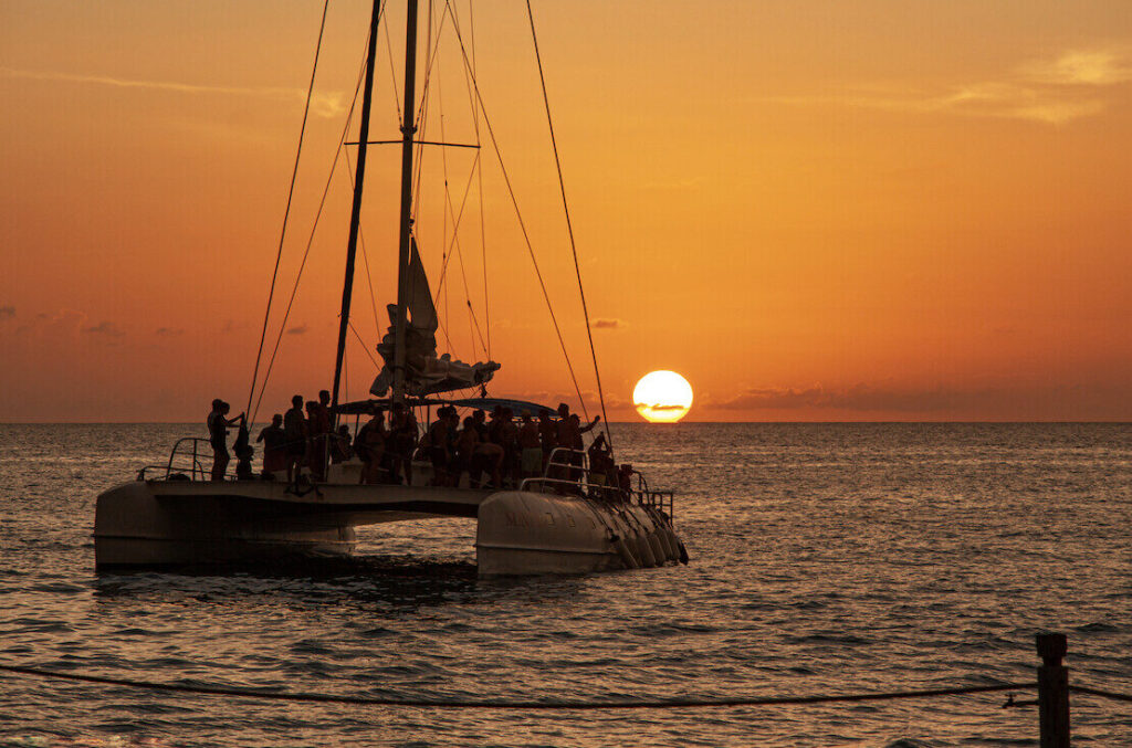 Marbella wedding trends 2025 - catamaran sunset cruise